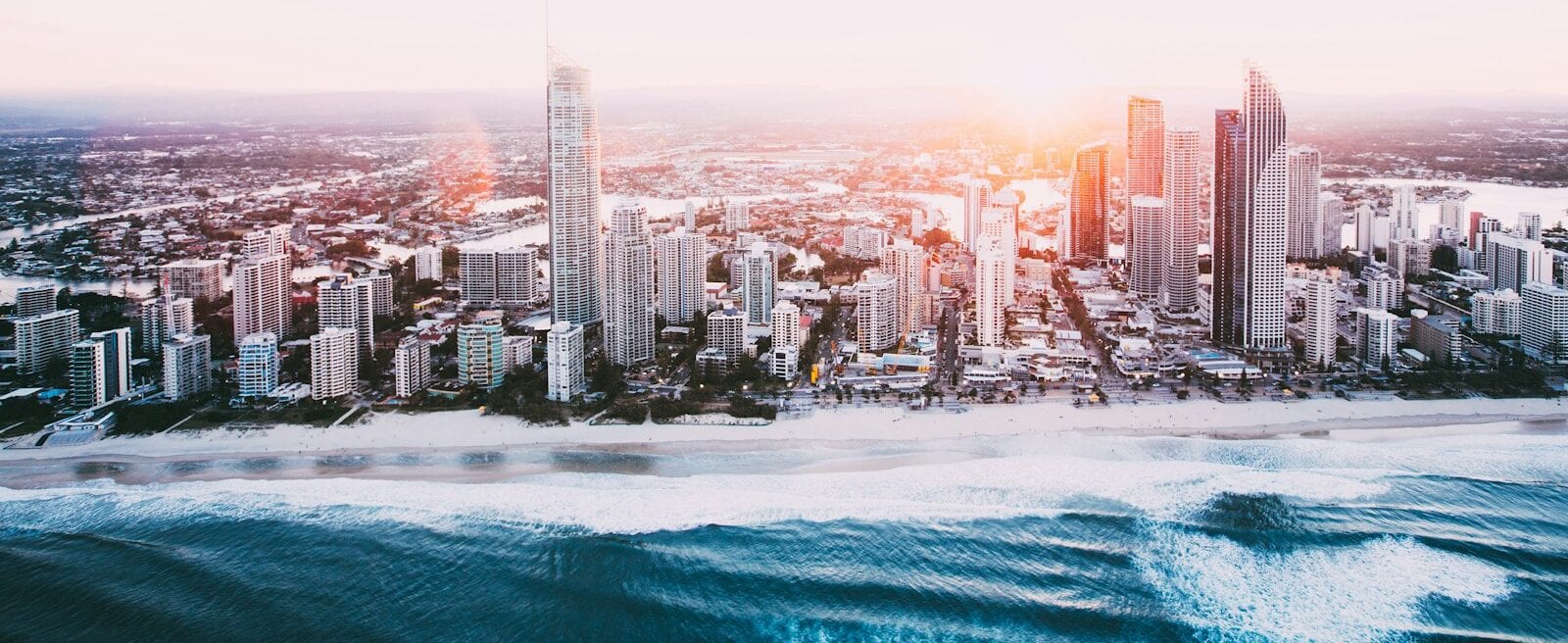 city skyline near body of water during daytime