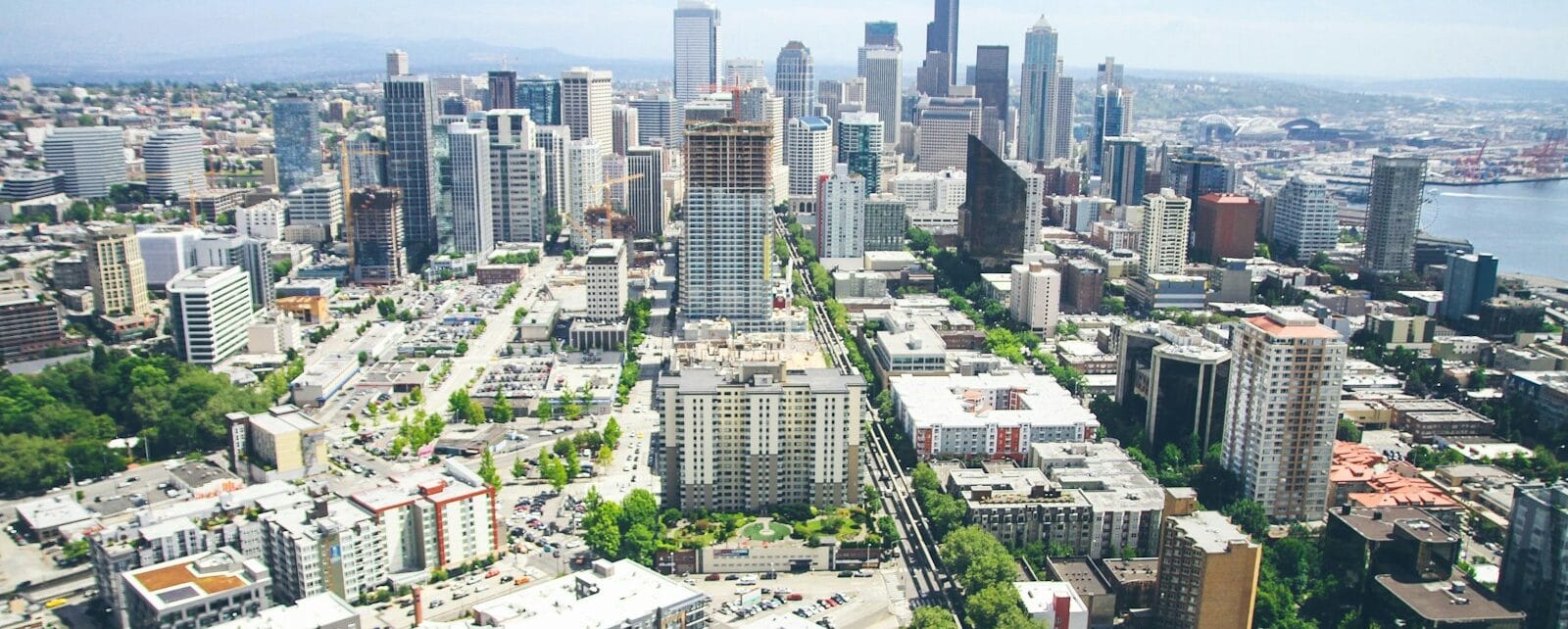 aerial photography of high-rise building under white and blue sky